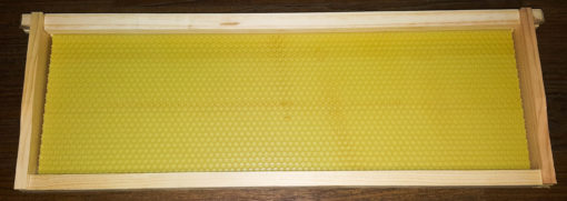 wooden super frame with waxed foundation